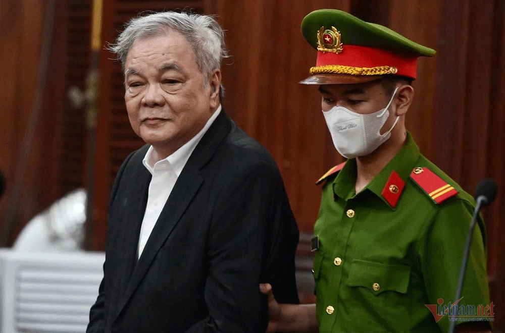 Ông Trần Quí Thanh ra tòa sáng nay. Ảnh: Nguyễn Huế