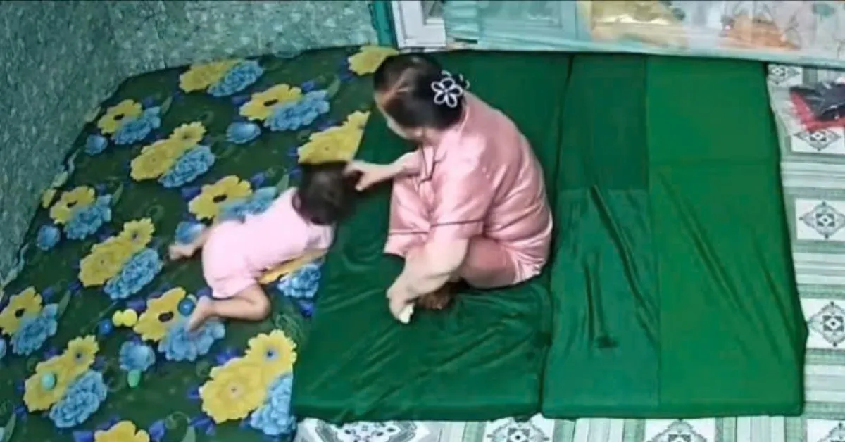 Bà Trần Thị Liên, hành nghề bảo mẫu ''chui'' đã thực hiện hành vi bạo hành bé P.V. Ảnh cắt từ clip. 